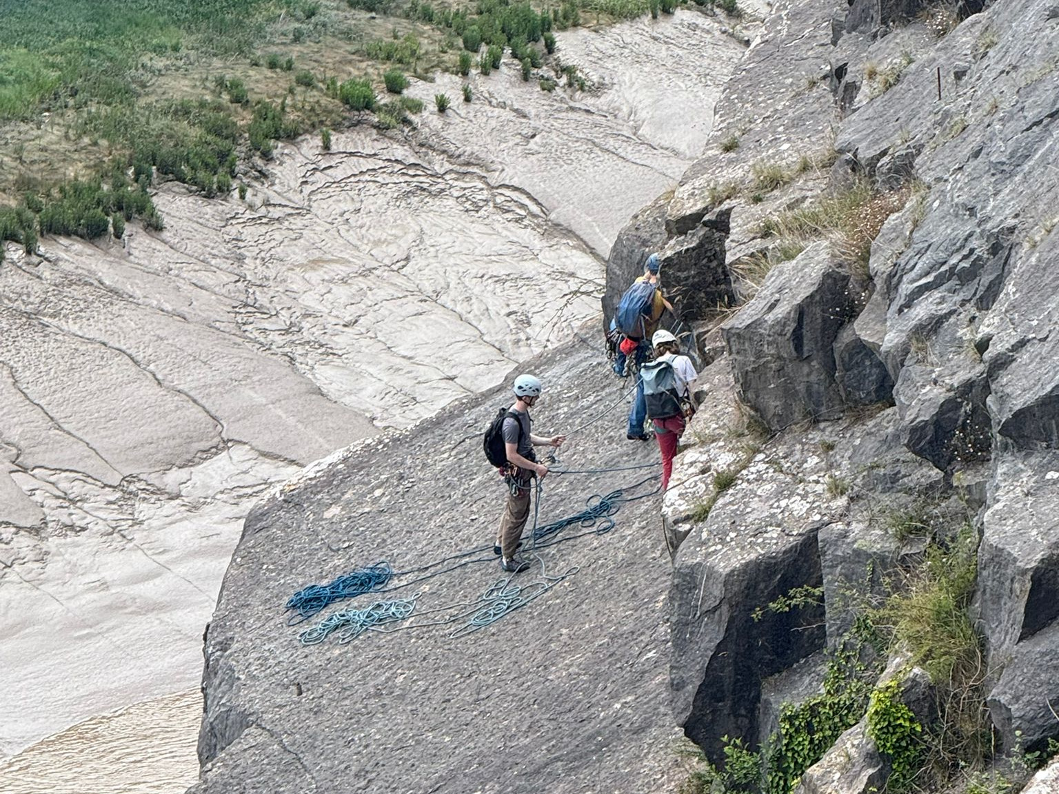 three of us standing on a ledge